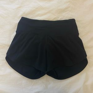 Lululemon black athletic shorts, size 0 tall, 4 inch inseam